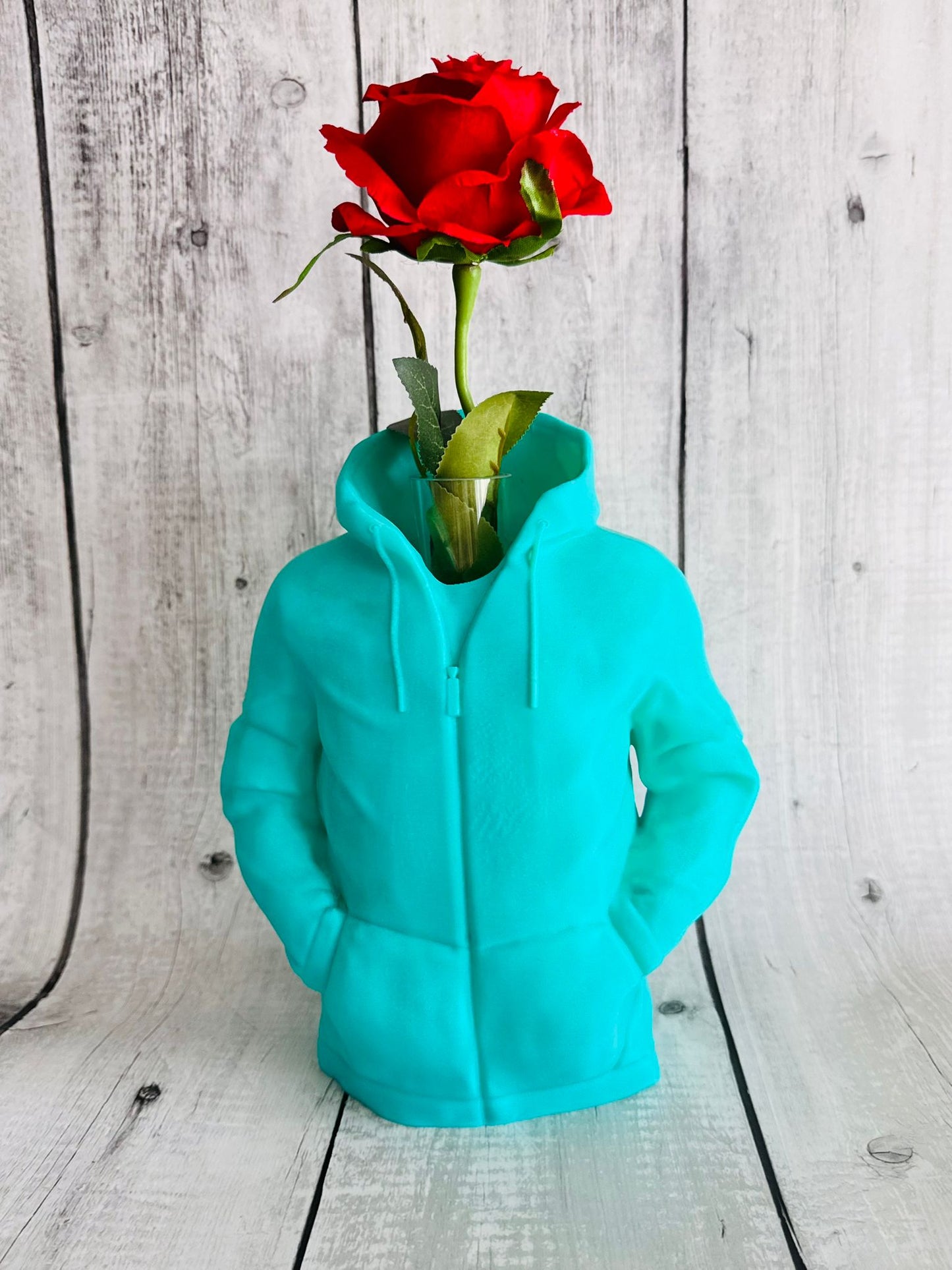 Flowers arranged in 3D printed hoodie vase